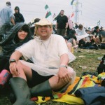 Started to rain when waiting for an act to come onto the pyramid stage, but we stayed happy.