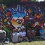 Graffiti fence offers shade